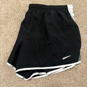 Nike Dri-Fit black women's shorts with white/gray stripe on side, XL